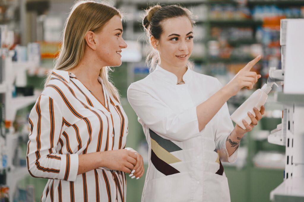 Woman pharmacist checking medicine in pharmacy